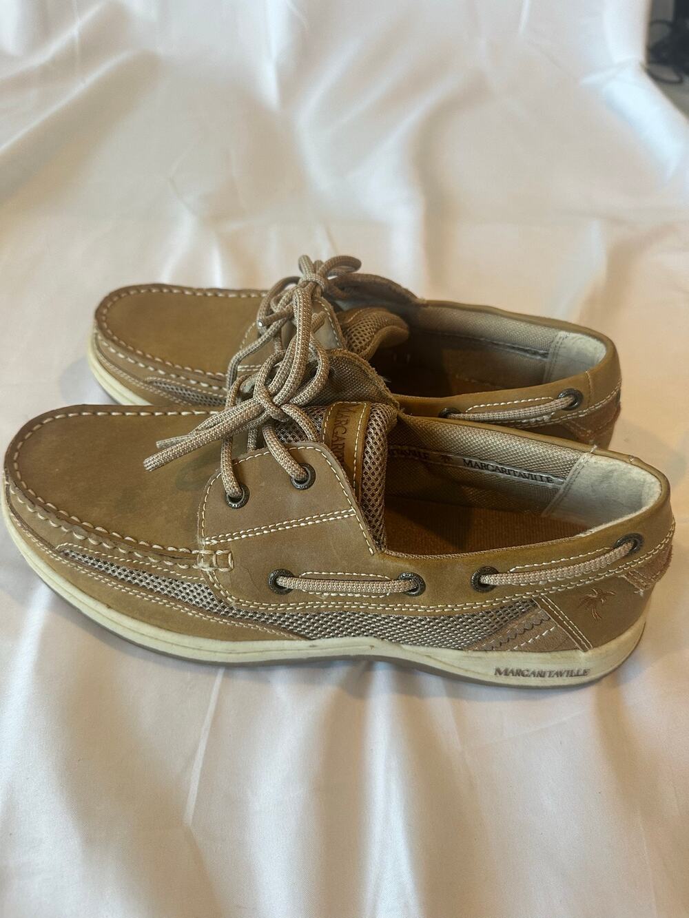 Margaritaville sold the tropics boat deck shoes, size 10